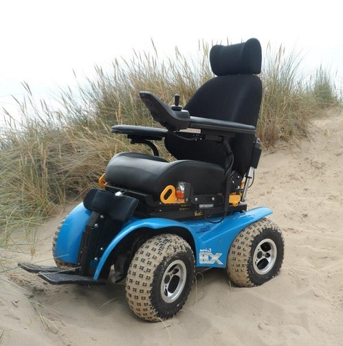 Power wheelchair in sand dunes