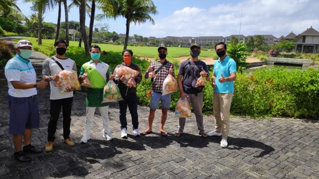 Bali National Staff receiving their food parcels
