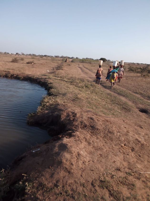 The women travel long distance from home to fetch water