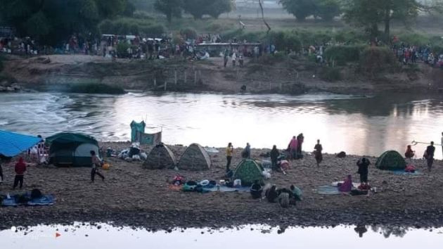 Myanmar war refugees stranded along the river bank, border with Thailand 